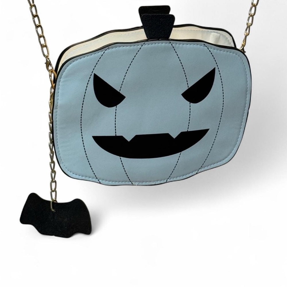 Jack-O-Lantern black and white pumpkin purse. Halloween time.